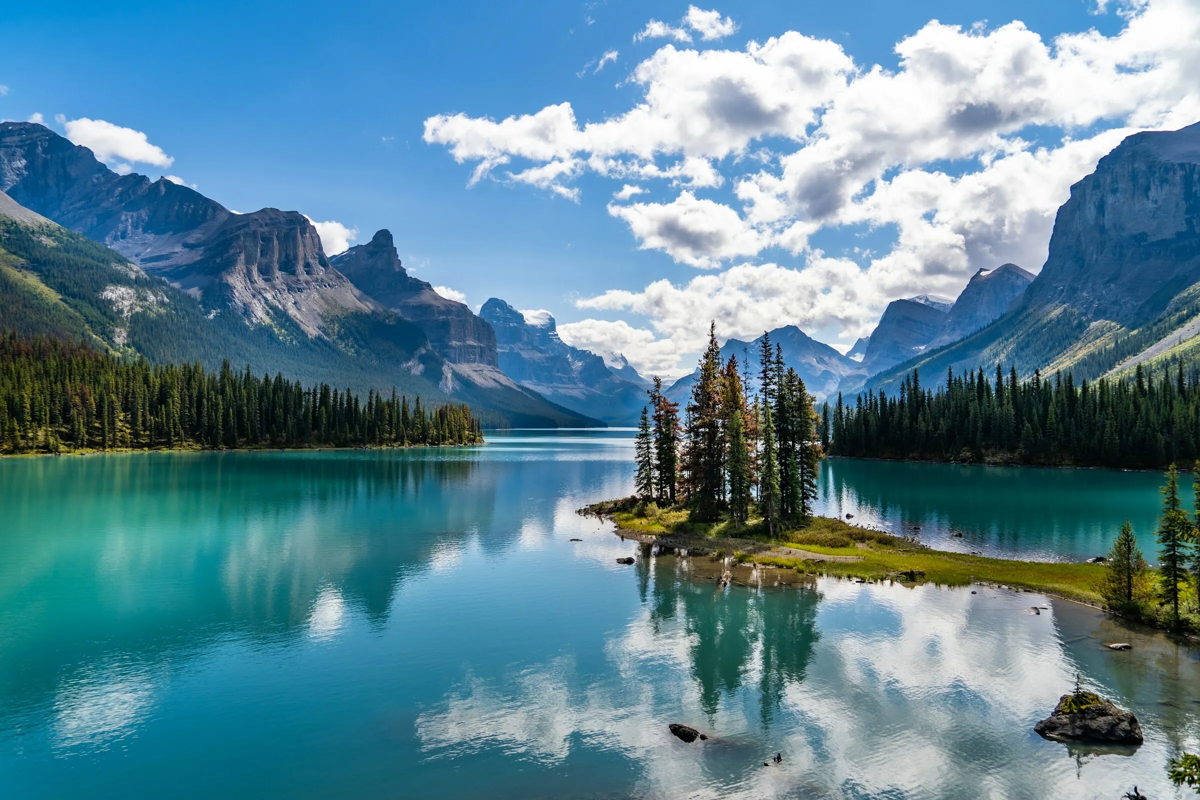 Turquoise water and mountain peaks surrounding Spirit Island in the Canadian Rockies