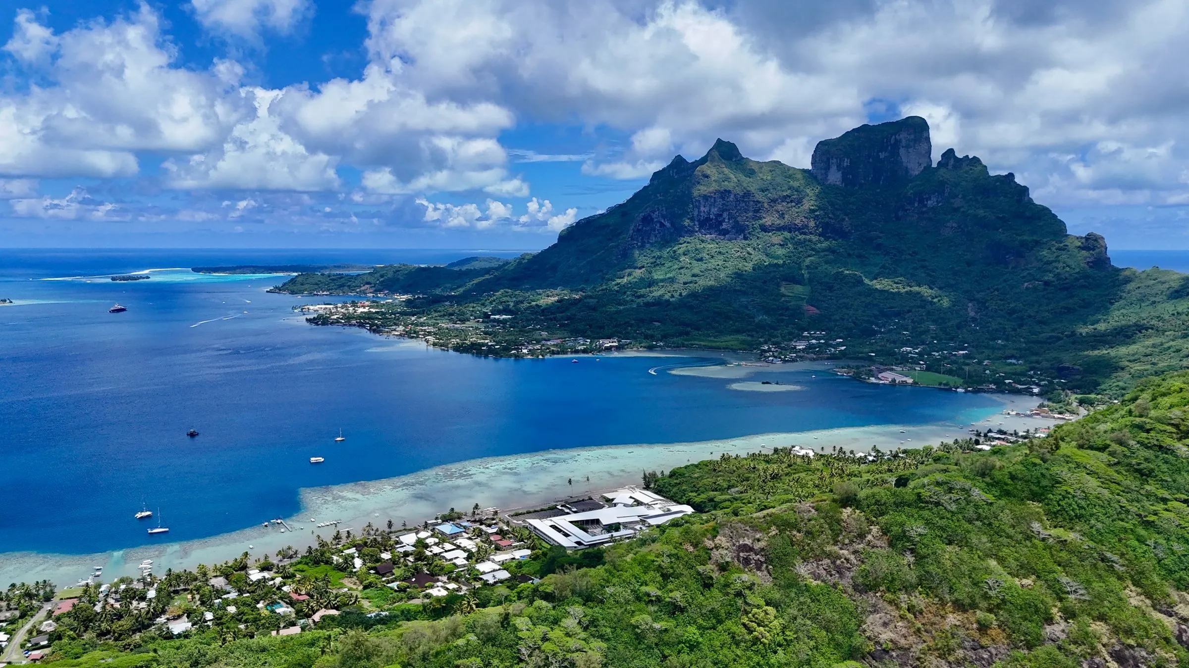 Bora Bora’s green volcanic mountain rising above its blue lagoon